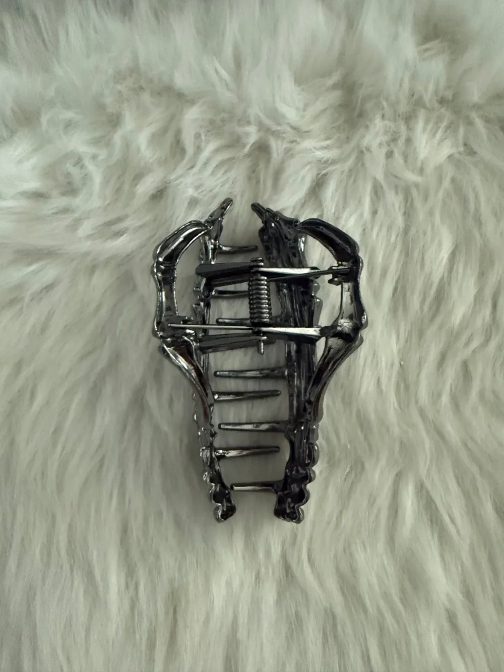 Nicole Miller NY Titanium Black Skelton Hand Hair Clip